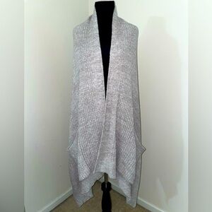 Soft light grey shawl from Maxfield Lux with pockets.
